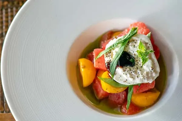 Burrata with heirloom tomatoes and basil